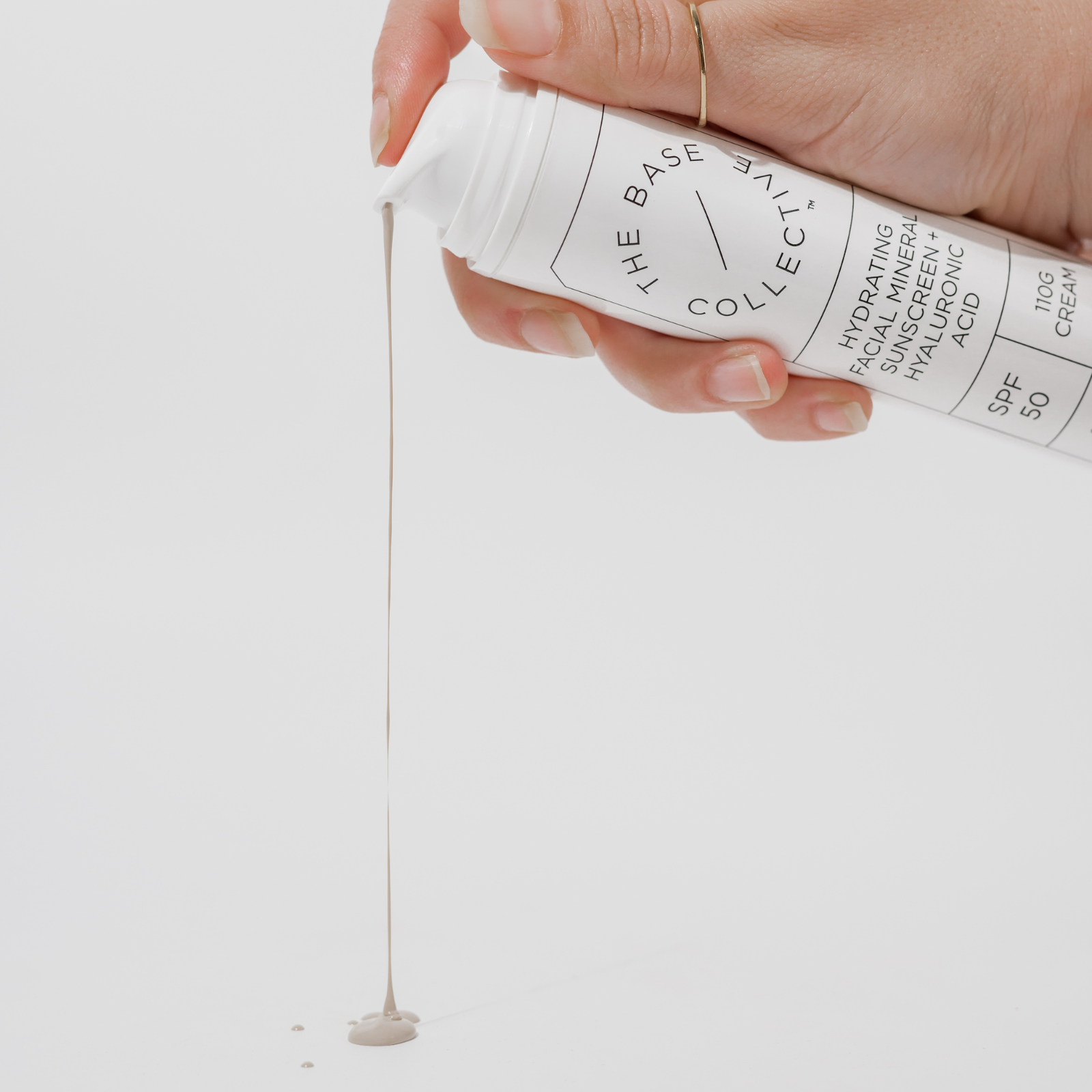 pouring sunscreen