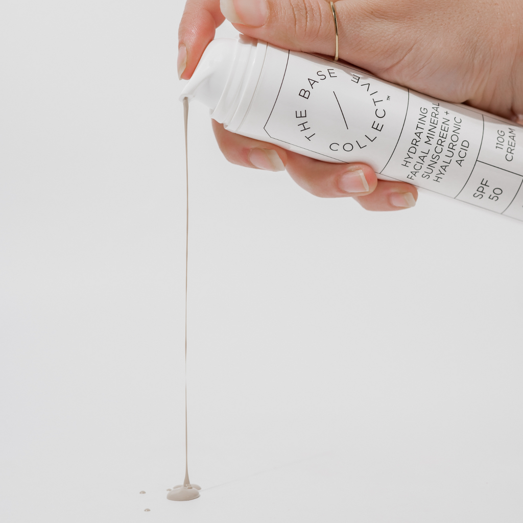 pouring sunscreen
