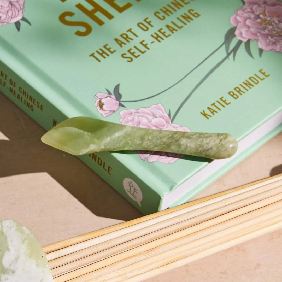 jade restorer placed on book