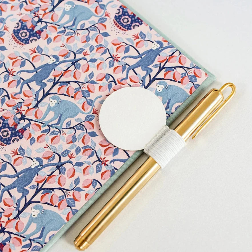 White pen loop and brass pen