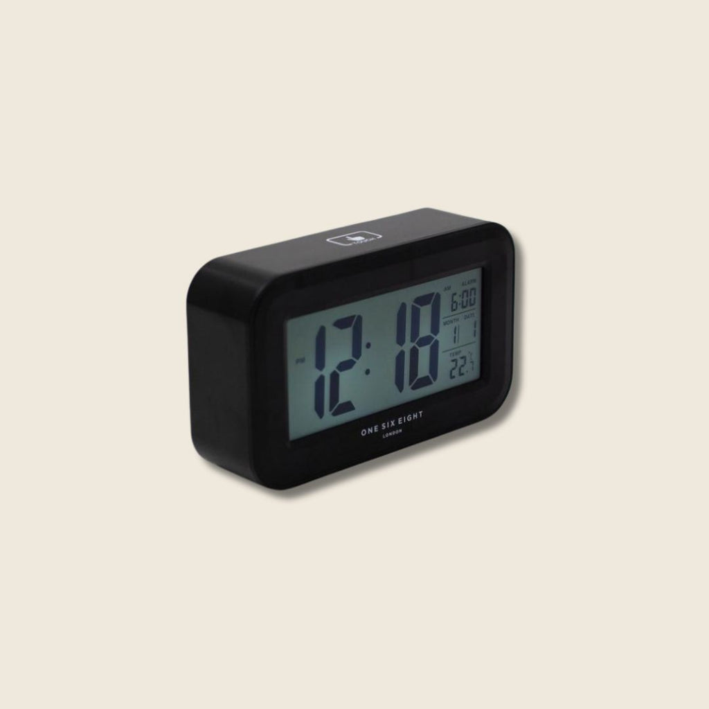 side of black alarm clock