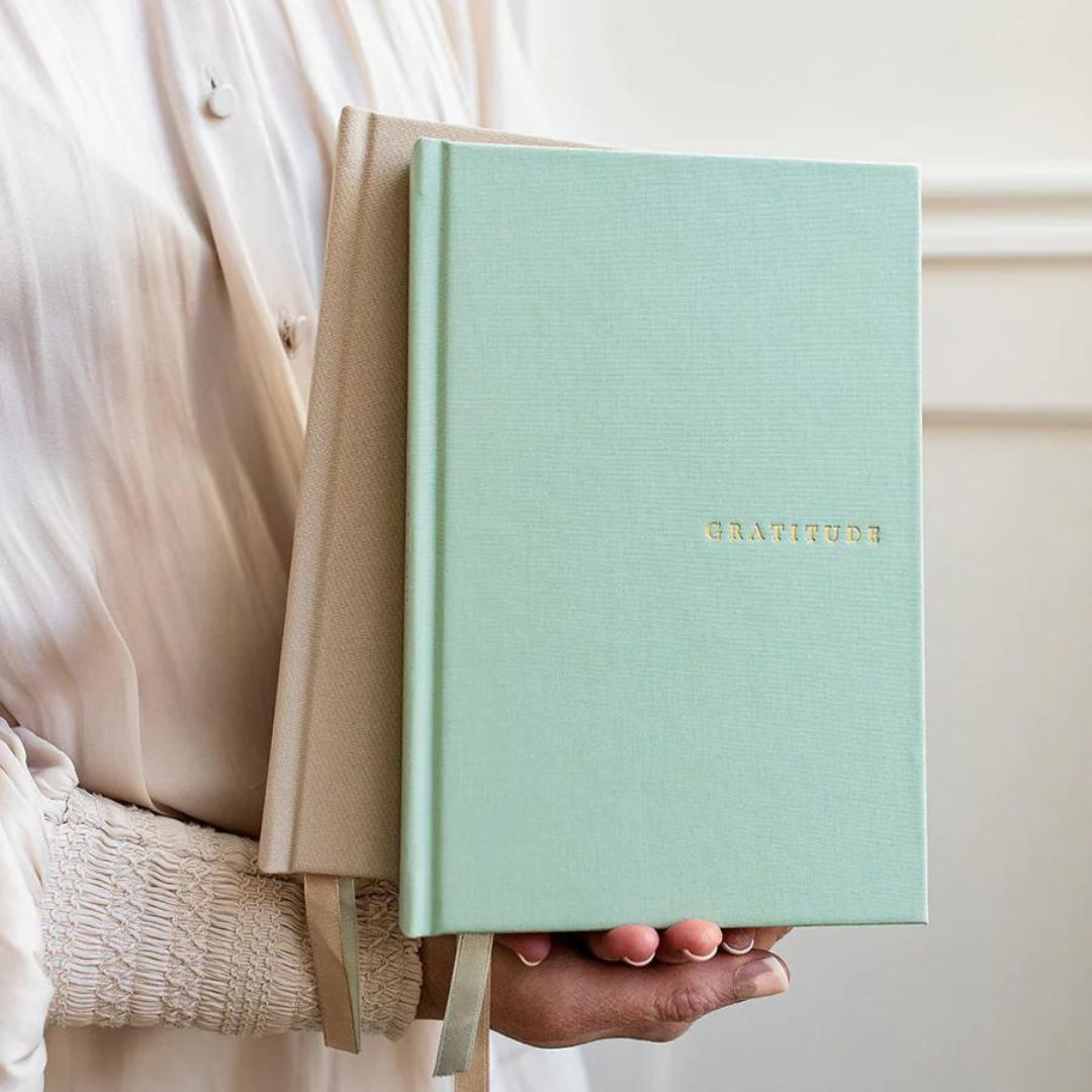 holding gratitude journals